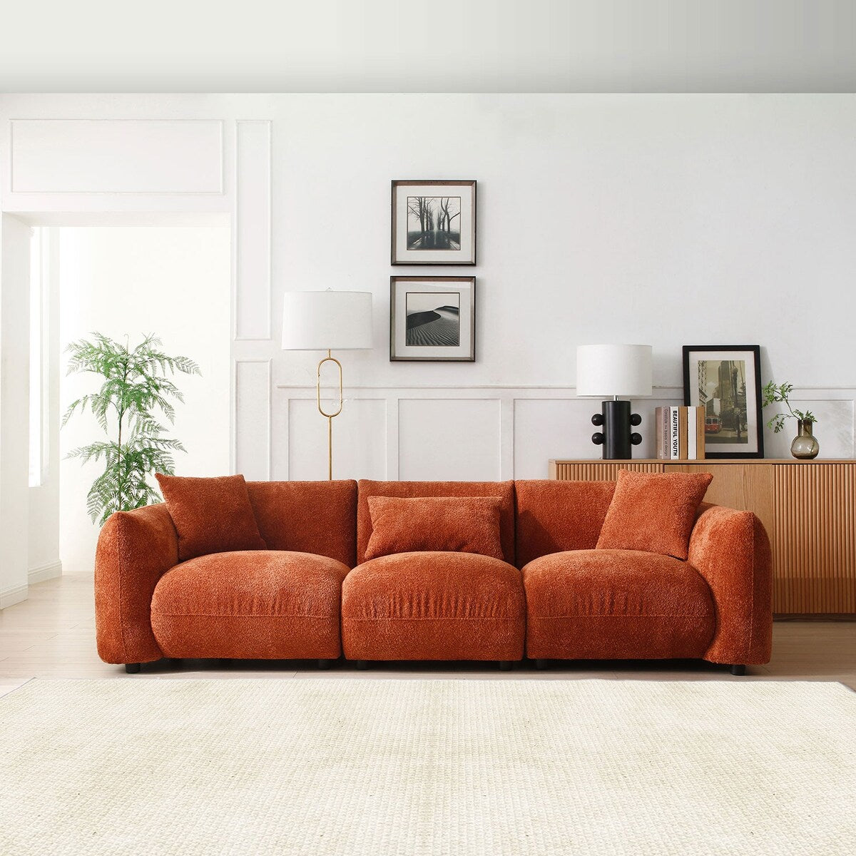 Canapé sectionnel blanc rembourré et confortable en duvet d'agneau doux avec pouf