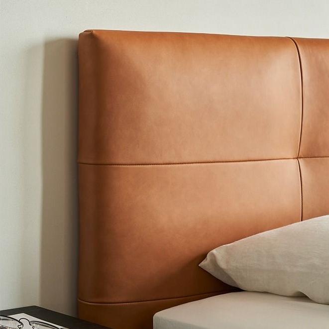 Lit en cuir couleur brique caramel