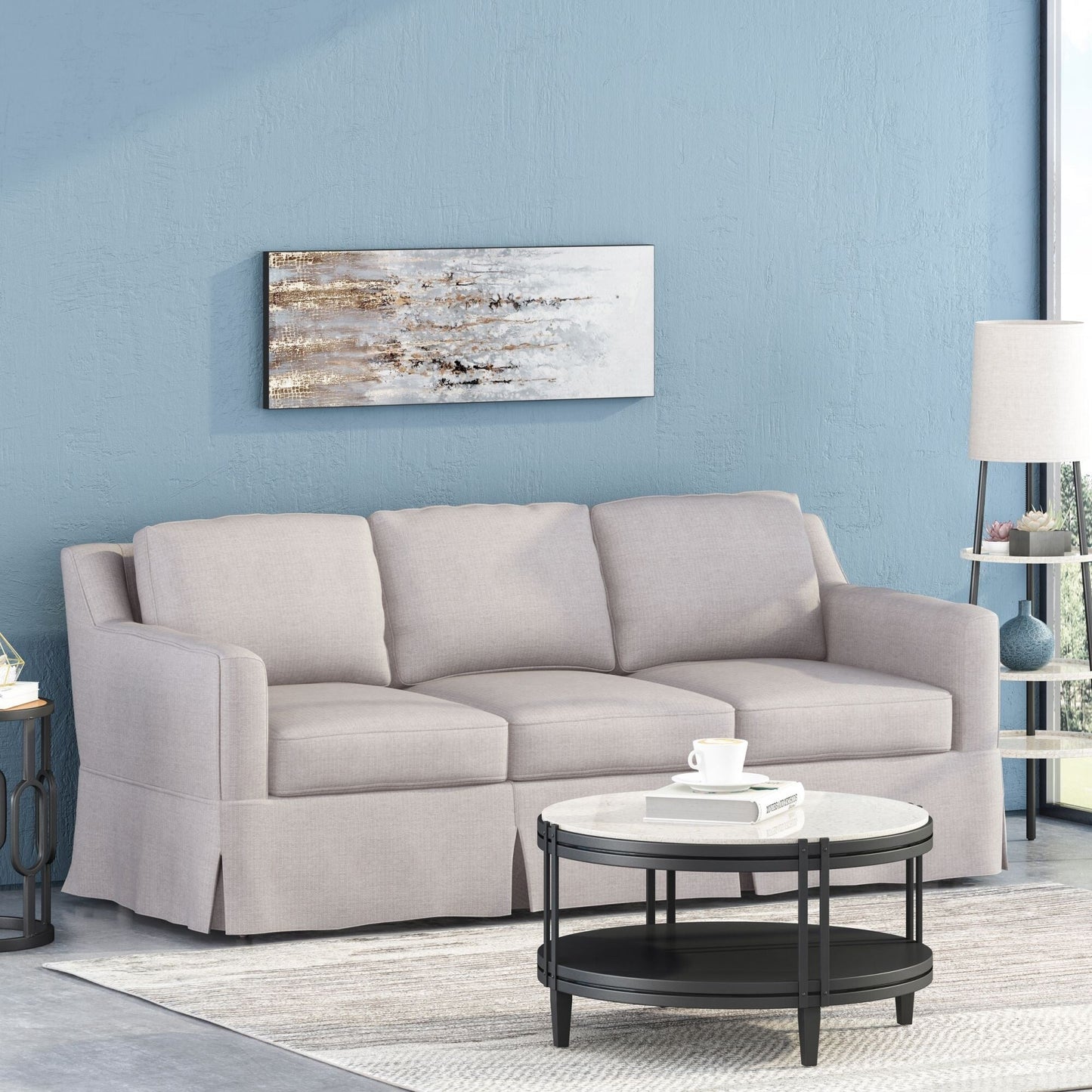 Canapé 3 places en tissu rayé avec accoudoirs encastrés et jupe pour salon