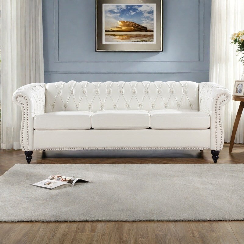 Canapé Chesterfield en cuir synthétique (3 places) avec accoudoirs roulés (84,65 $)