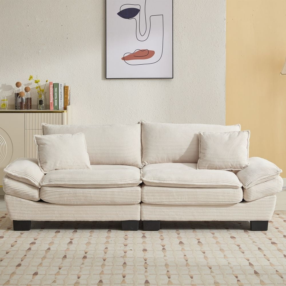 Canapé à assise profonde rembourré en velours côtelé