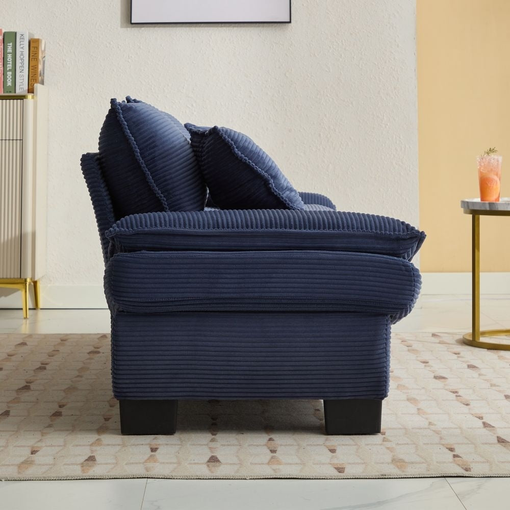 Canapé à assise profonde rembourré en velours côtelé