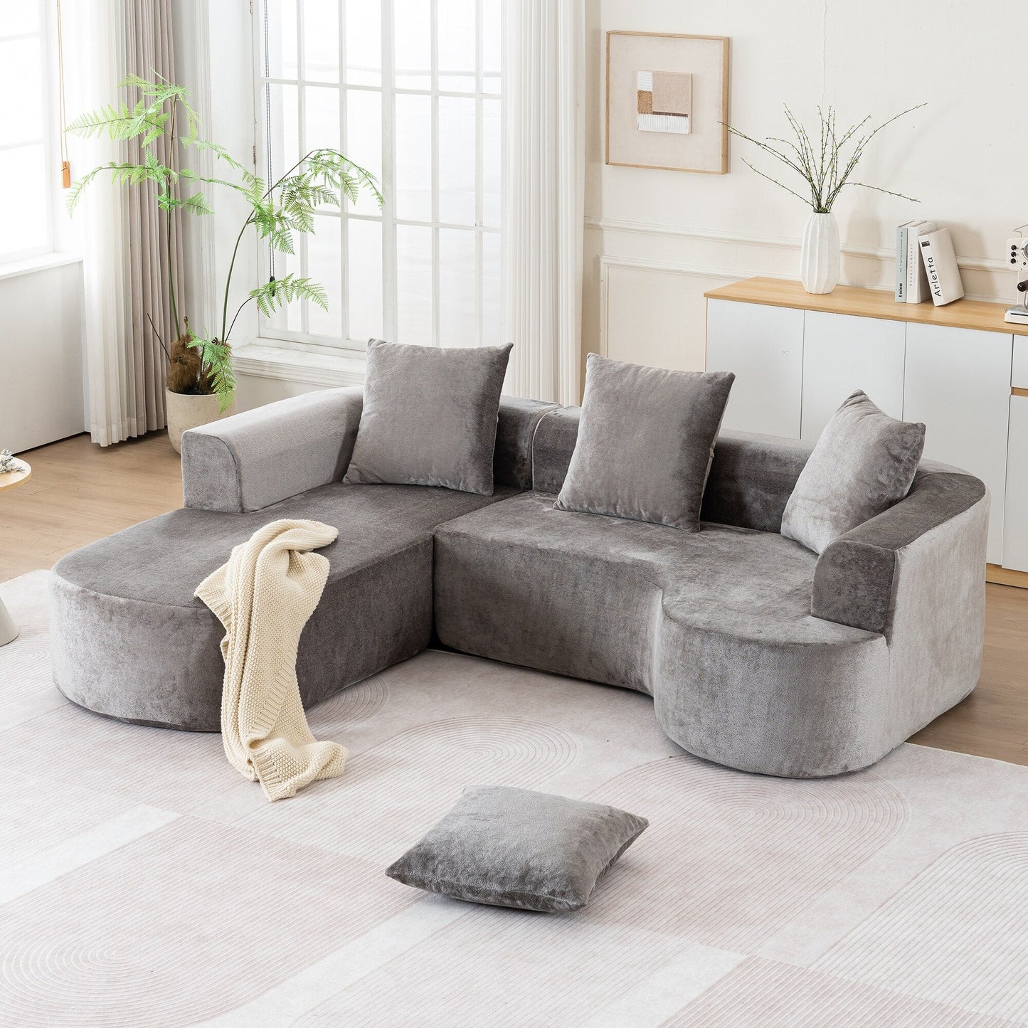 Canapé-lit modulaire en L avec méridienne et assise profonde pour salon ou bureau