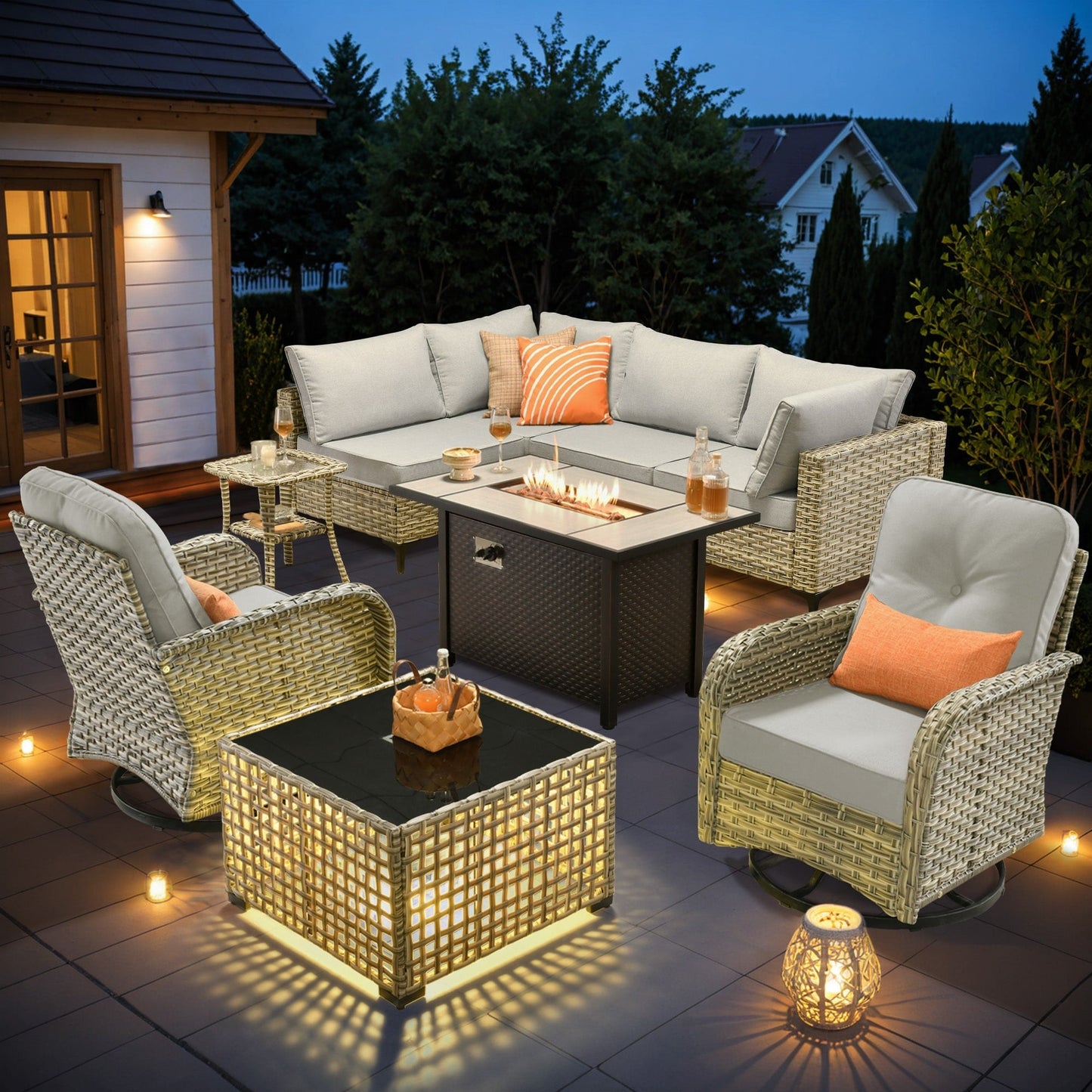 Ensemble de 9 chaises pivotantes d'extérieur en osier OVIOS avec table à feu