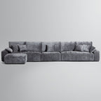 Le canapé et le pouf gris Empress