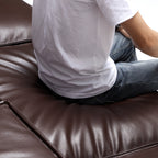 Fauteuil de luxe minimaliste en cuir marron foncé