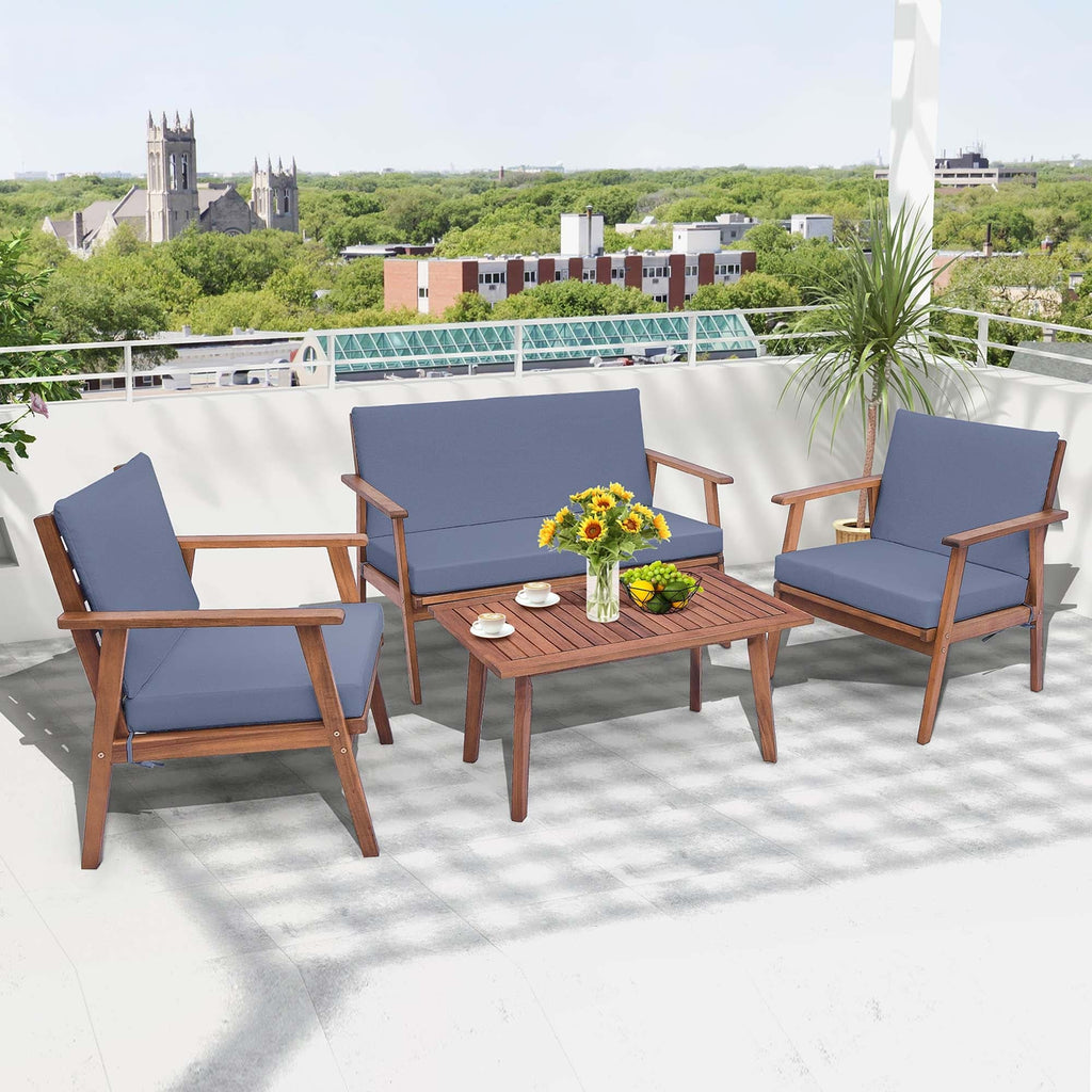 Ensemble de conversation de patio 4 pièces en bois d'acacia avec canapé, table basse et coussins