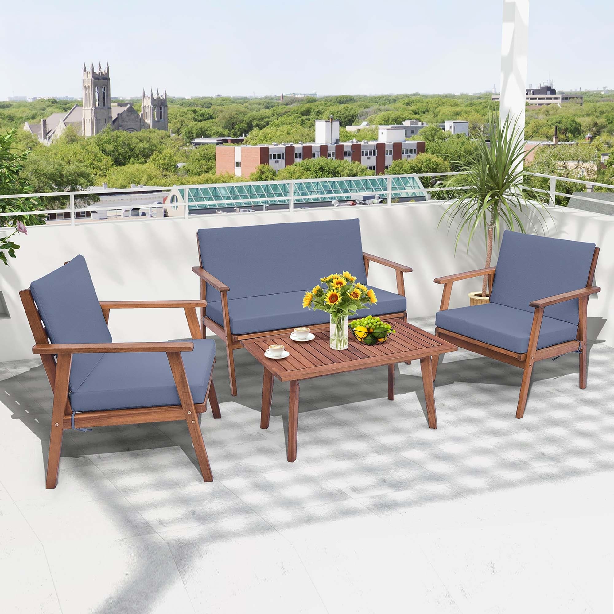 Ensemble de conversation de patio 4 pièces en bois d'acacia avec canapé, table basse et coussins