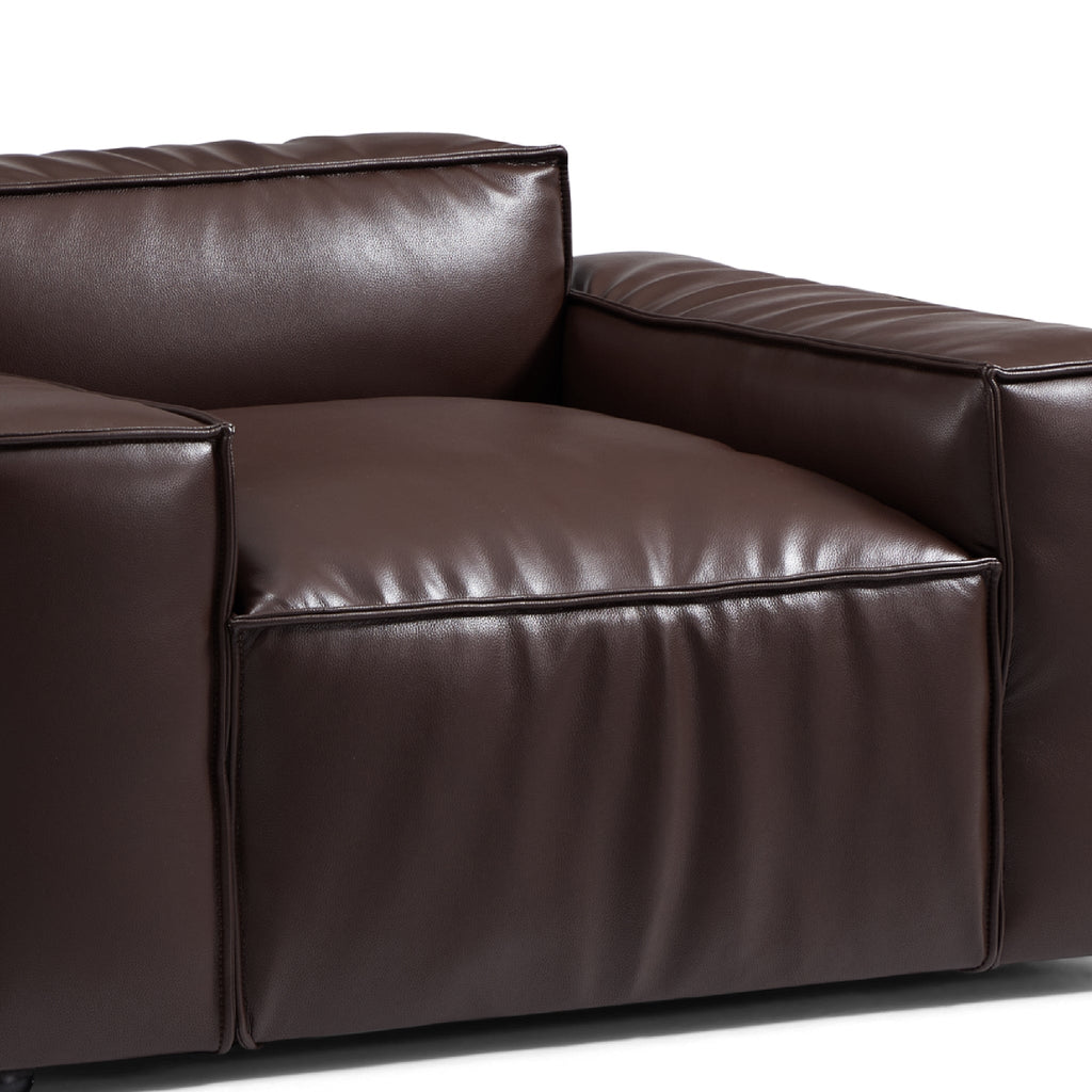 Fauteuil de luxe minimaliste en cuir marron foncé