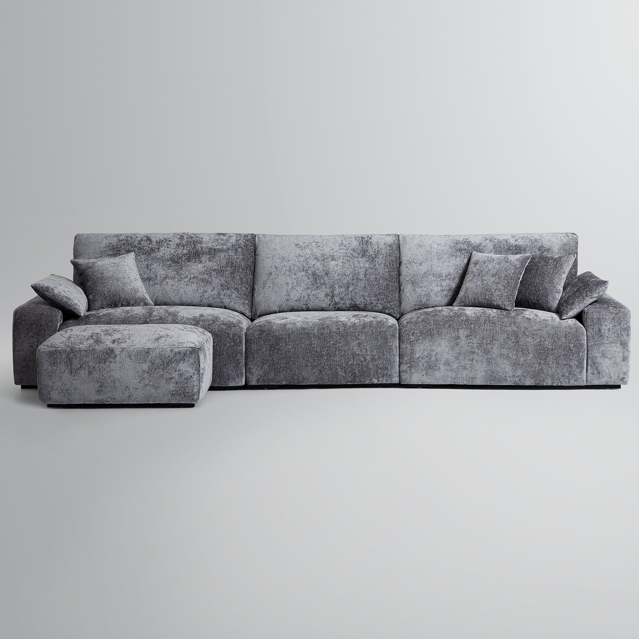 Le canapé et le pouf gris Empress