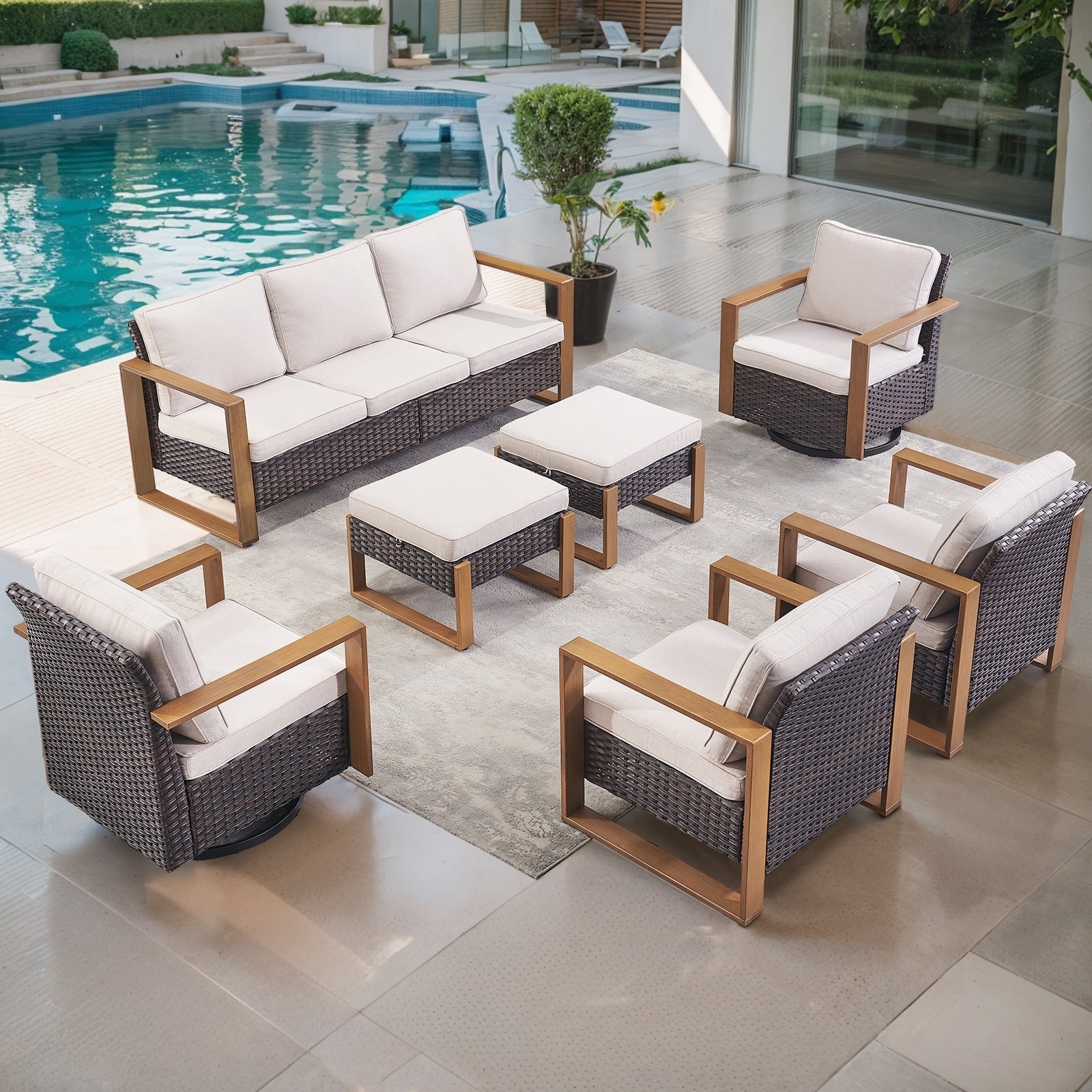 Ensemble de salon de jardin Gymojoy 7 pièces avec fauteuil à bascule pivotant en rotin et poufs