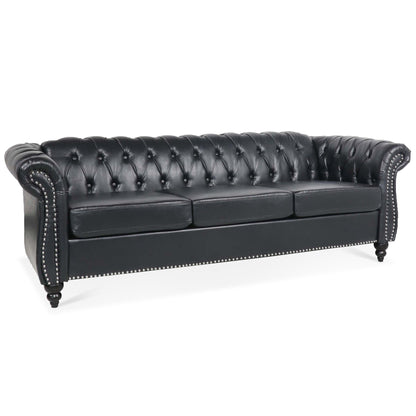 Canapé Chesterfield trois places en similicuir avec accoudoirs roulés