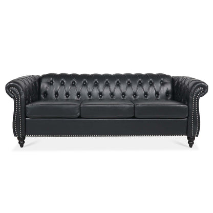 Canapé Chesterfield trois places en similicuir avec accoudoirs roulés