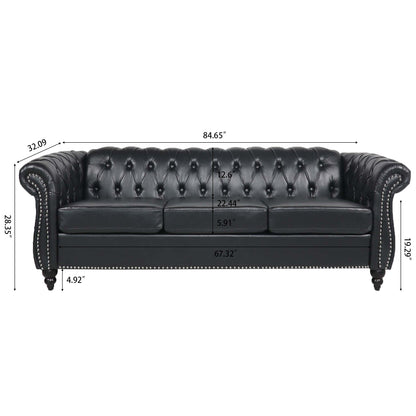 Canapé Chesterfield trois places en similicuir avec accoudoirs roulés