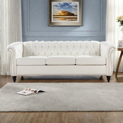 Canapé Chesterfield en cuir synthétique (3 places) avec accoudoirs roulés (84,65 $)