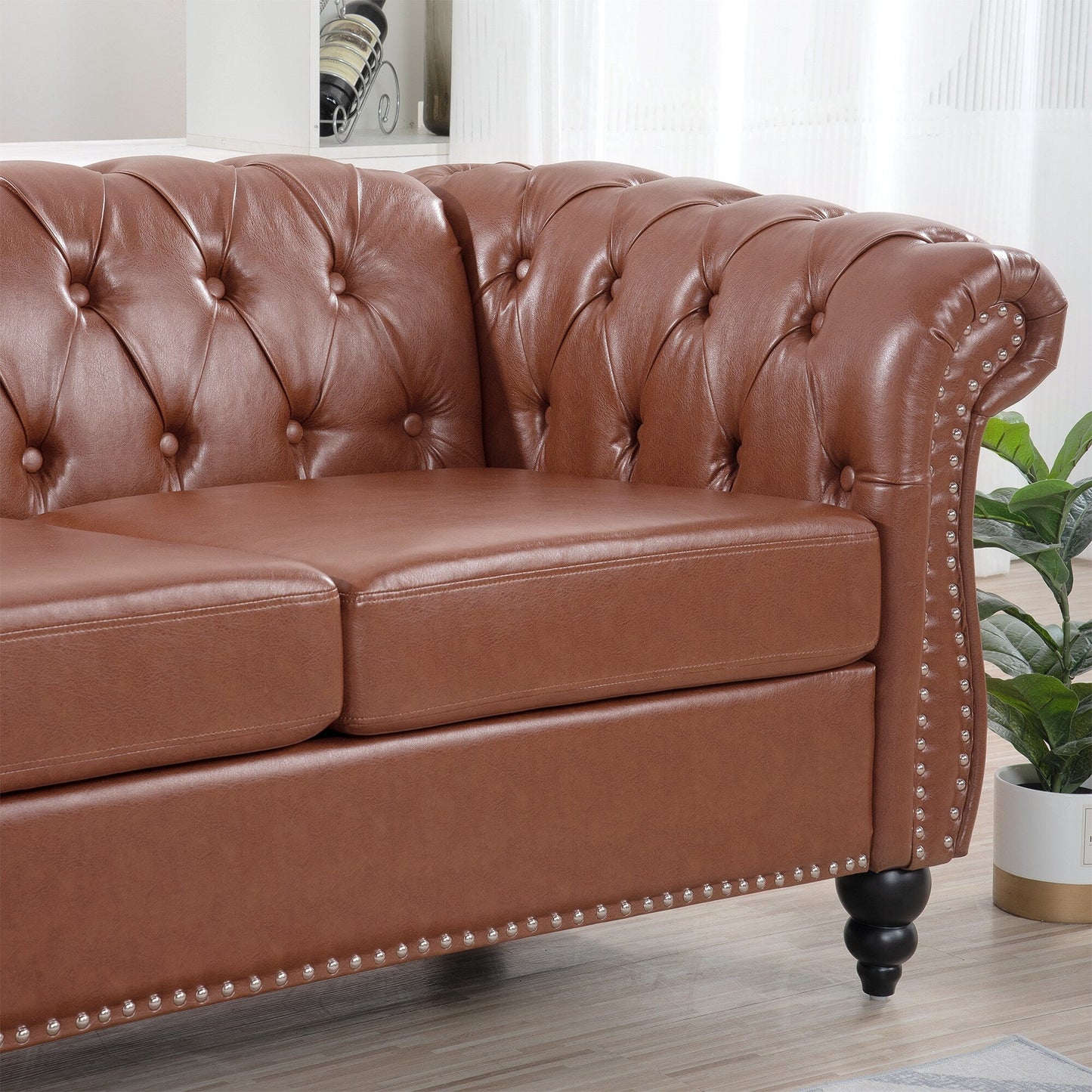 Canapé Chesterfield en cuir synthétique (3 places) avec accoudoirs roulés (84,65 $)
