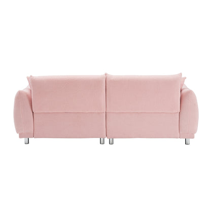 Un canapé rose en polaire de 86,6 pouces avec quatre coussins et des pieds en quincaillerie peut s'asseoir confortablement dans une chambre d'appartement