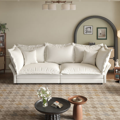 Canapés modernes à assise profonde avec plusieurs grands coussins moelleux
