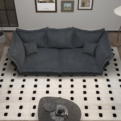 Canapés modernes à assise profonde avec plusieurs grands coussins moelleux