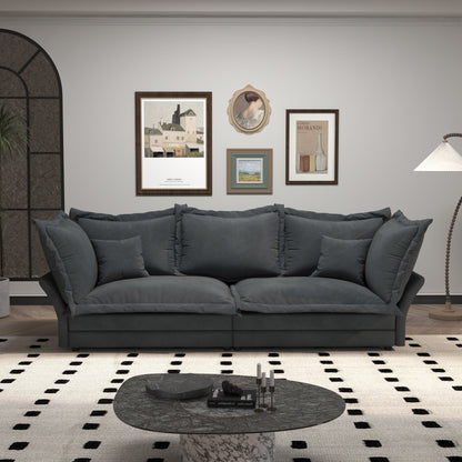 Canapés modernes à assise profonde avec plusieurs grands coussins moelleux