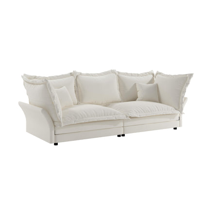 Canapés modernes à assise profonde avec plusieurs grands coussins moelleux