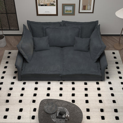 Canapés modernes à assise profonde avec plusieurs grands coussins moelleux