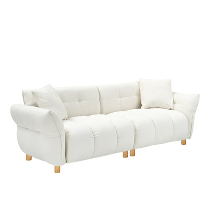 Canapé Teddy de 93,70 pouces de long, avec deux coussins assortis et trois sièges spacieux et confortables.