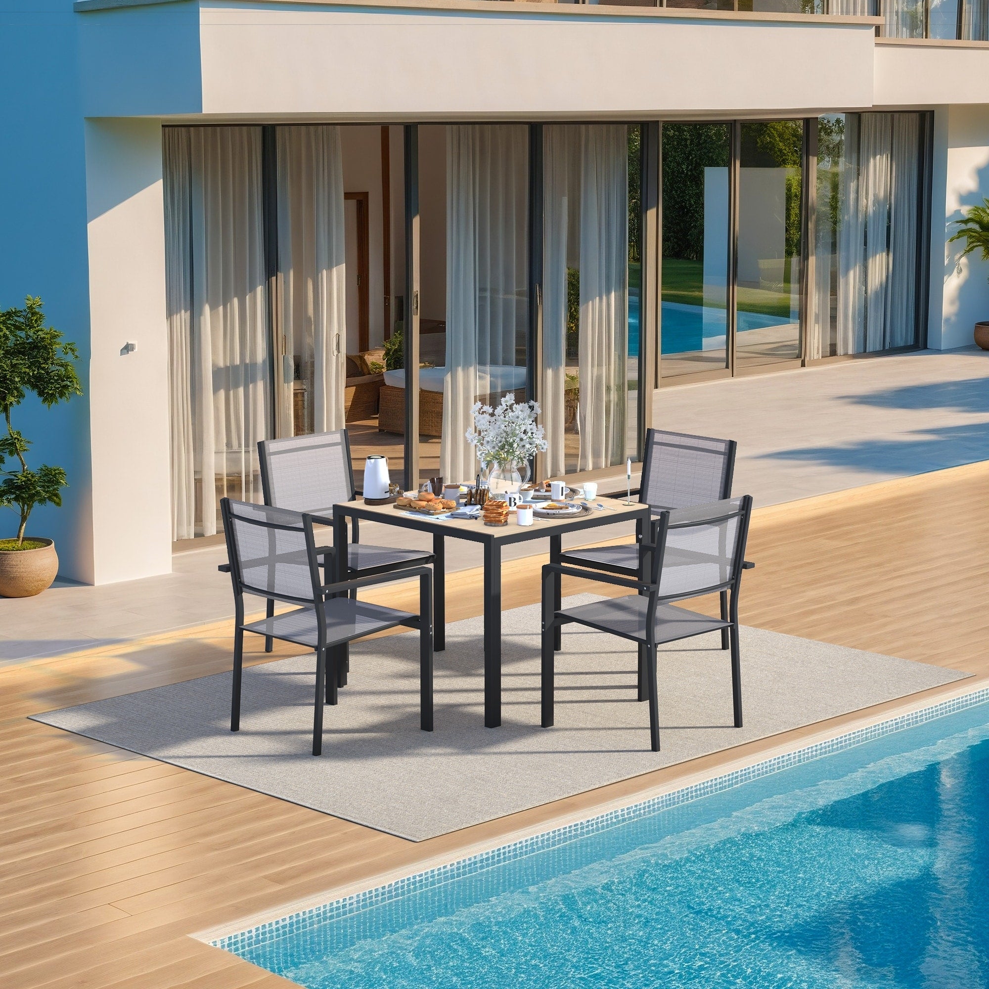 Ensemble de salle à manger d'extérieur avec table et chaises empilables en textilène, plateau de table en WPC durable 5 pièces et cadre antirouille pour patio