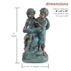 Statue d'une fille et d'un garçon lisant ensemble