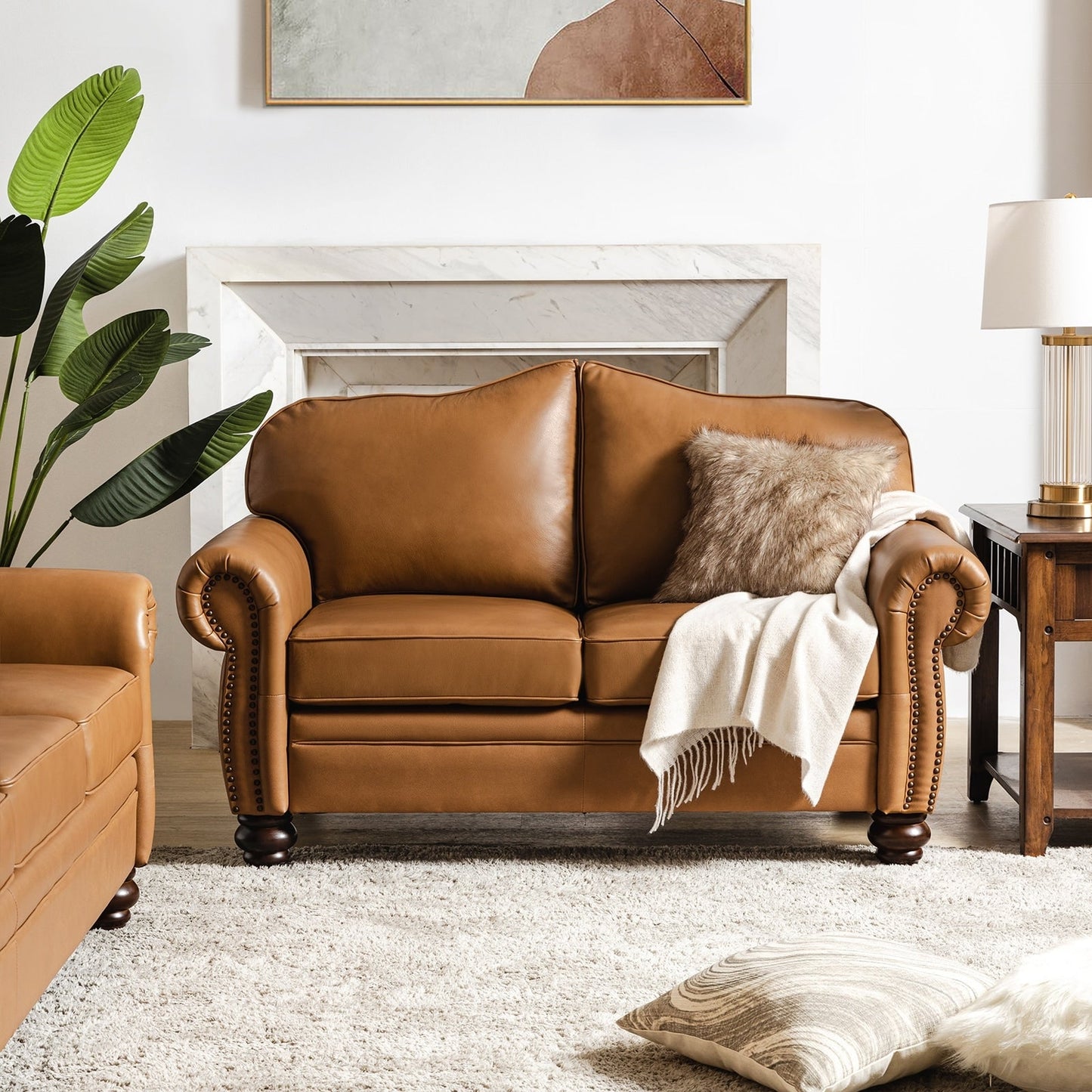 Canapé transitionnel Angel en cuir véritable avec dossier capitonné par HULALA HOME