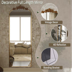 Miroir arqué pleine longueur avec motif floral baroque