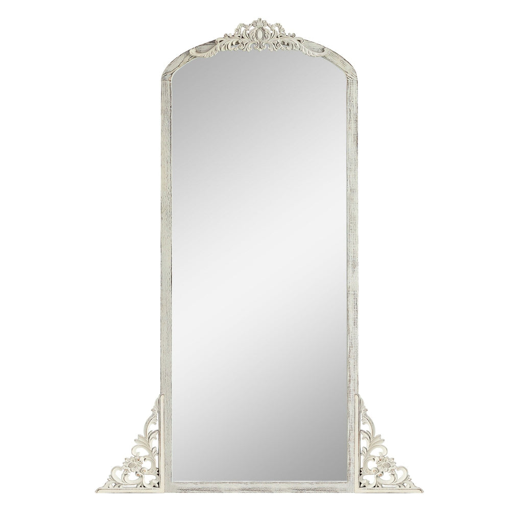 Miroir de sol sculpté en bois massif de forme arquée sur toute la longueur