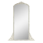 Miroir de sol sculpté en bois massif de forme arquée sur toute la longueur