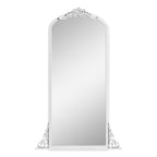 Miroir de sol sculpté en bois massif de forme arquée sur toute la longueur