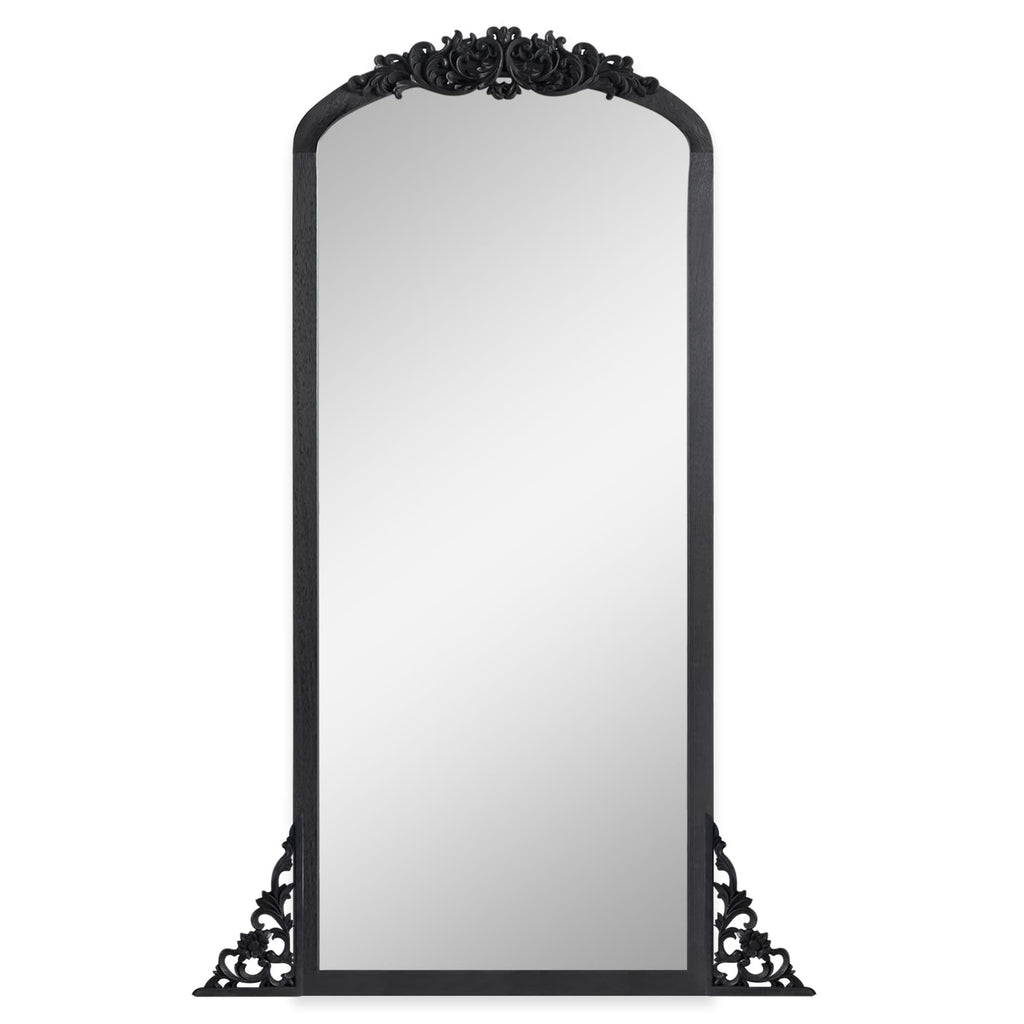 Miroir de sol sculpté en bois massif de forme arquée sur toute la longueur