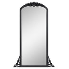 Miroir de sol sculpté en bois massif de forme arquée sur toute la longueur