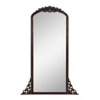 Miroir de sol sculpté en bois massif de forme arquée sur toute la longueur