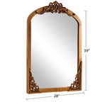 Miroir de sol sculpté en bois massif de forme arquée sur toute la longueur