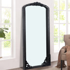 Miroir de sol sculpté en bois massif de forme arquée sur toute la longueur