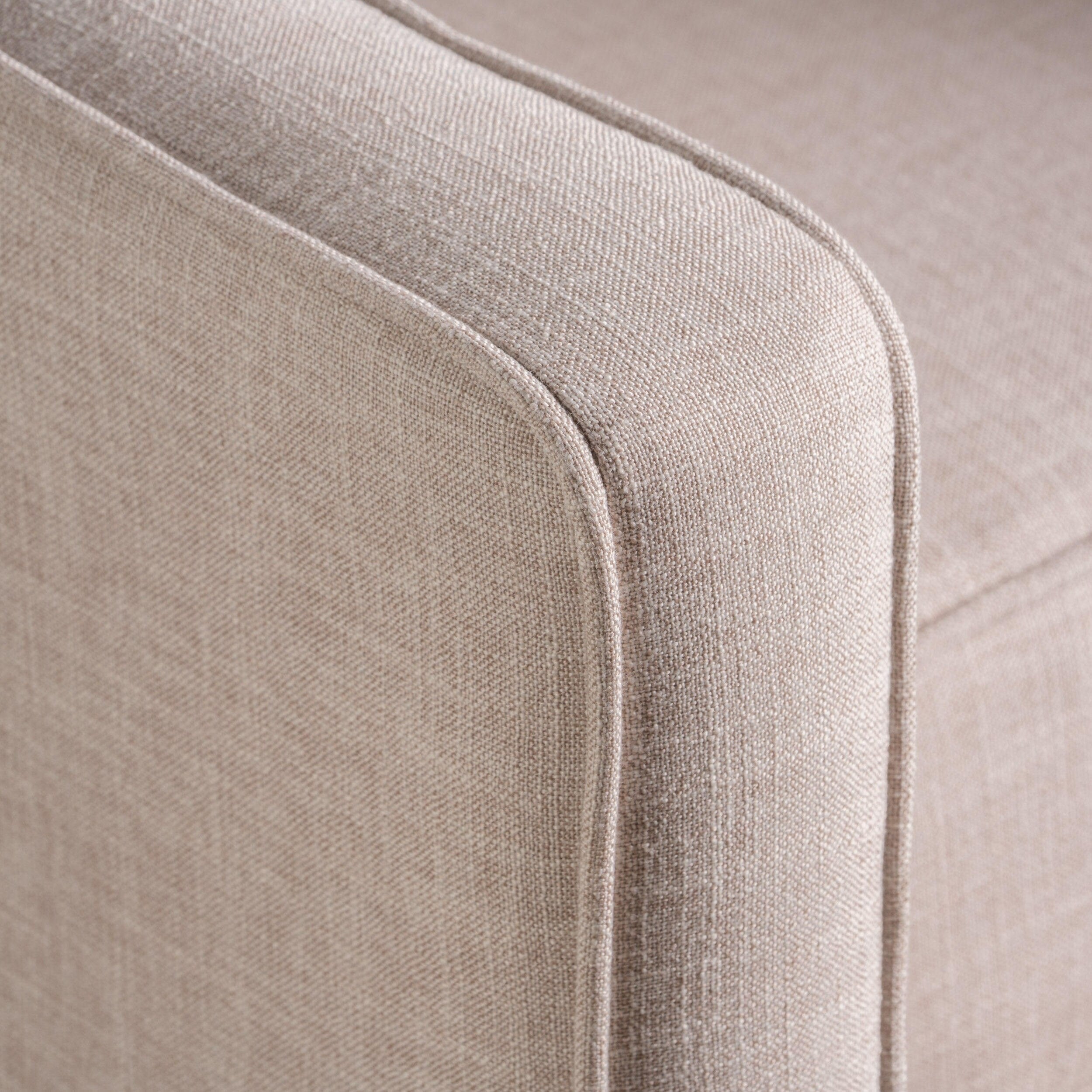 Fauteuil inclinable rembourré en tissu beige de style milieu du siècle avec repose-pieds, dossier capitonné et pieds en hêtre