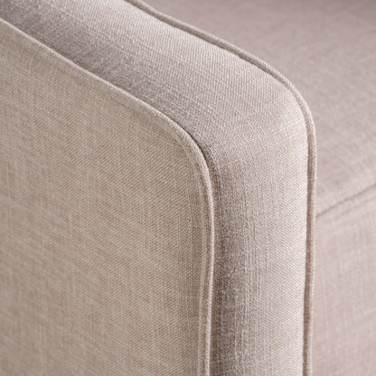 Fauteuil inclinable rembourré en tissu beige de style milieu du siècle avec repose-pieds, dossier capitonné et pieds en hêtre