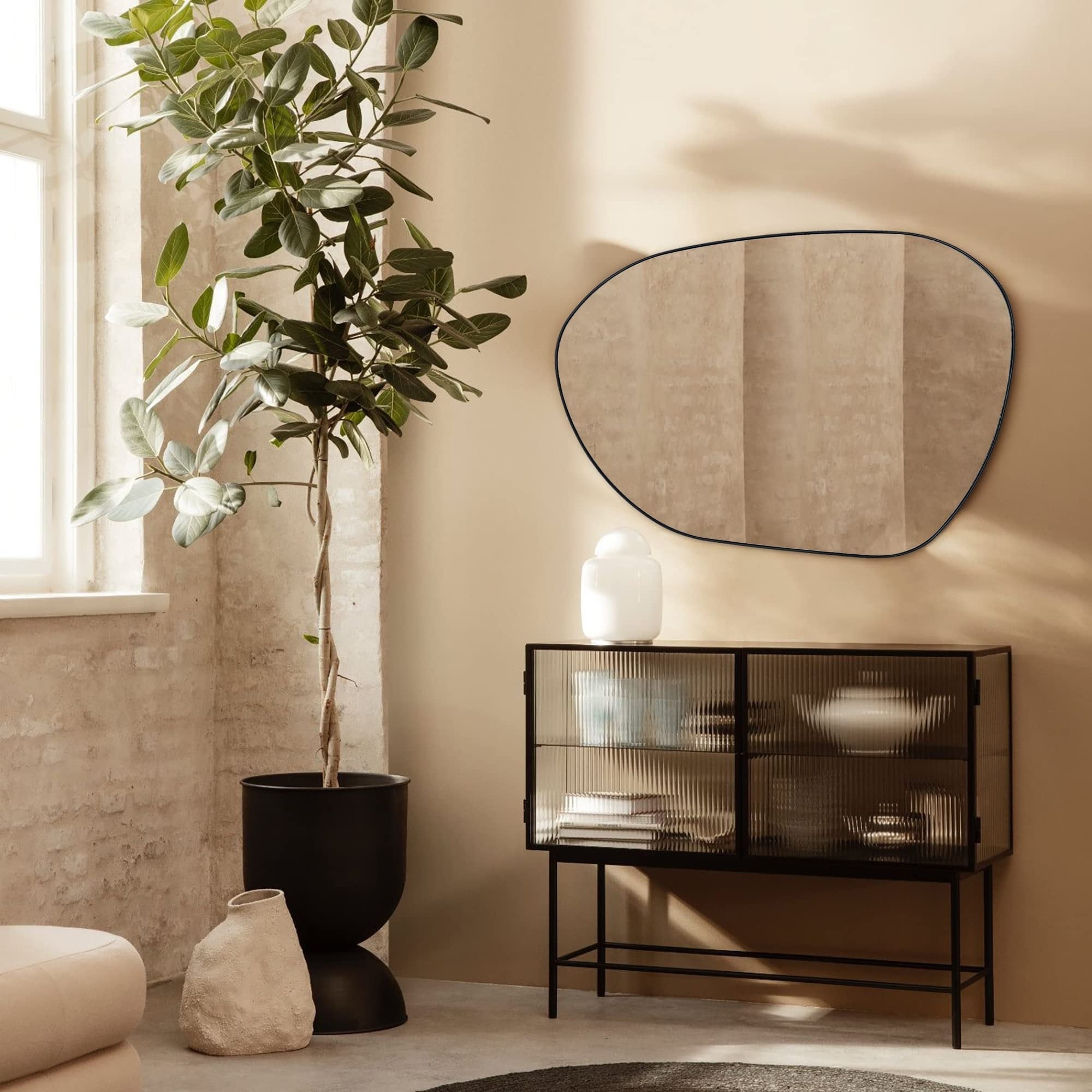 Miroir mural TEHOME Bertlinde de forme irrégulière pour salon
