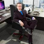 Fauteuil de bureau pivotant ergonomique en cuir PU noir avec repose-pieds, dossier capitonné et décoration cloutée
