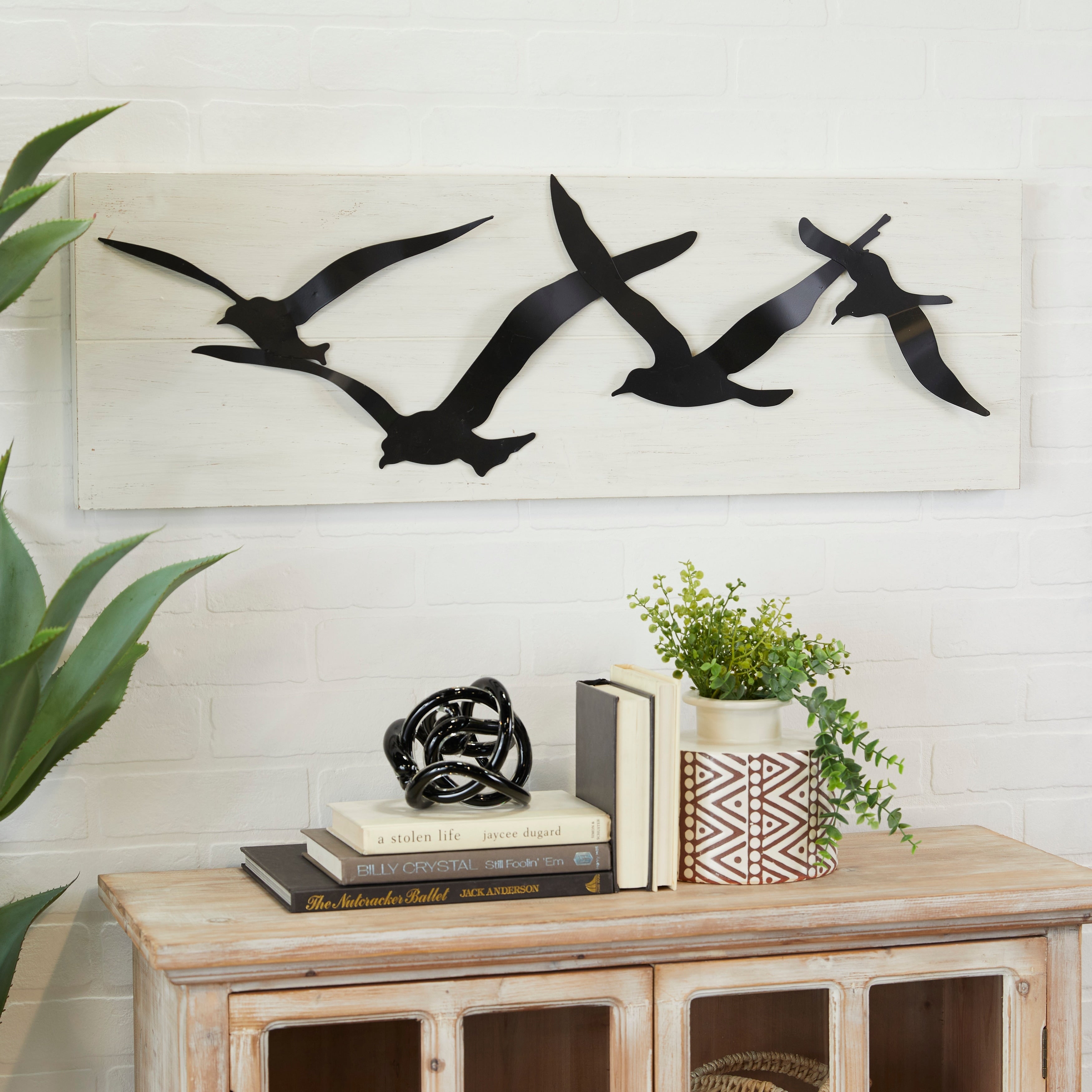 Décoration murale oiseau en métal noir