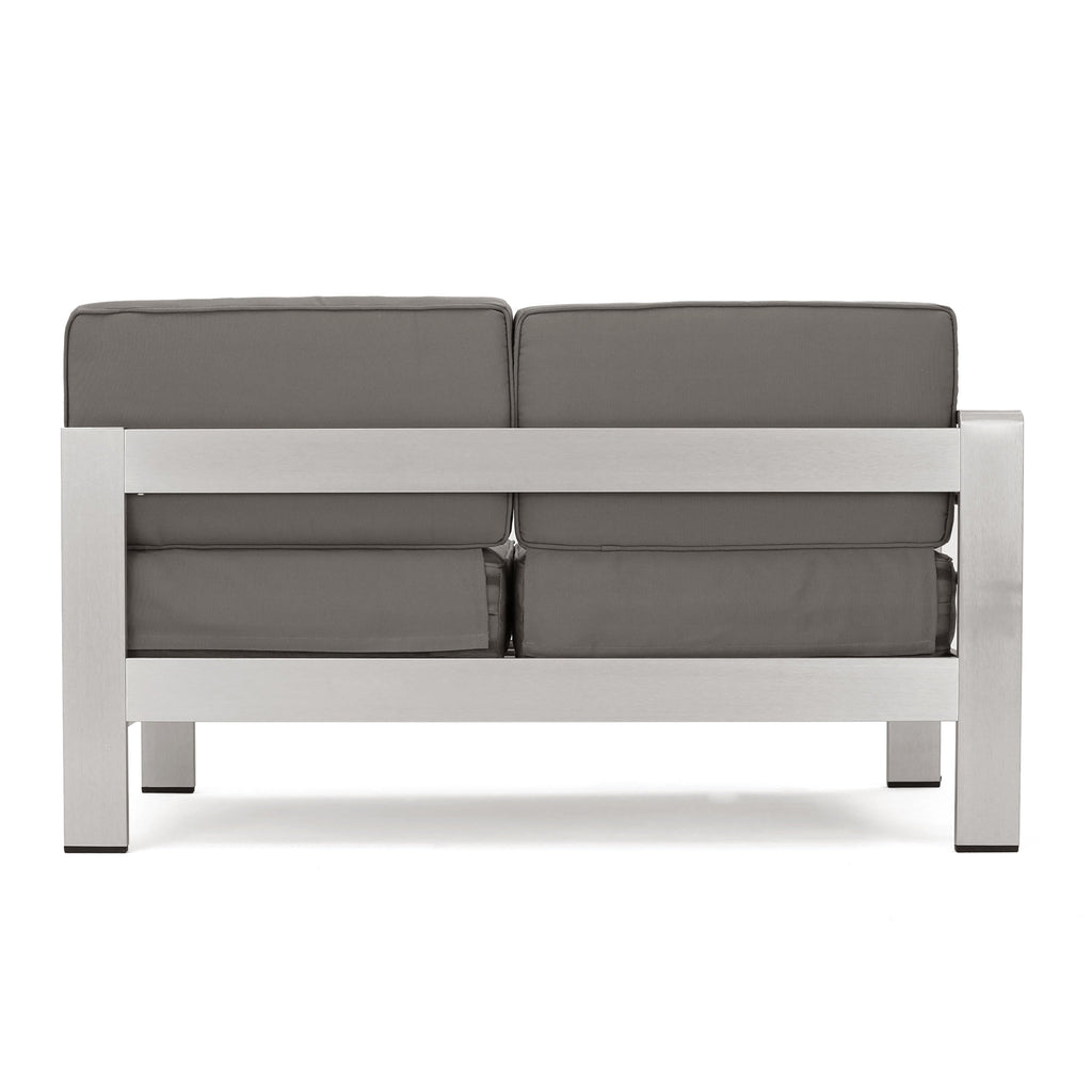 Ensemble de canapés d'extérieur 5 places en V en aluminium avec pouf Cape Coral par Christopher Knight Home