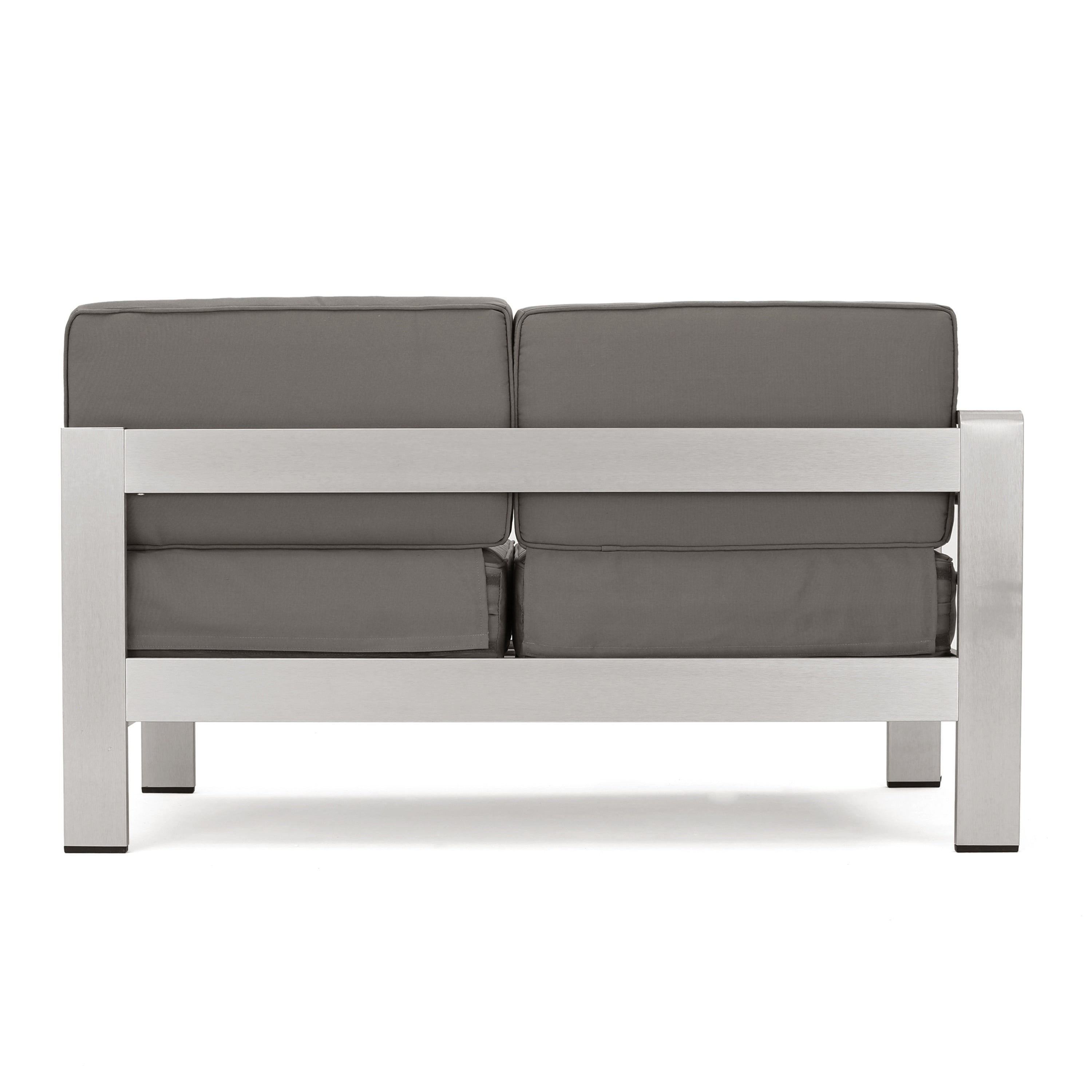 Ensemble de canapés d'extérieur 5 places en V en aluminium avec pouf Cape Coral par Christopher Knight Home