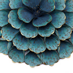Décoration murale en métal bleu sarcelle avec motif floral Carson Carrington Mjugg