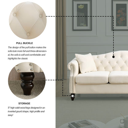 Canapé Chesterfield 3 places capitonné avec accoudoirs roulés et clous décoratifs