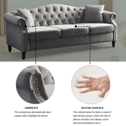 Canapé Chesterfield 3 places capitonné avec accoudoirs roulés et clous décoratifs