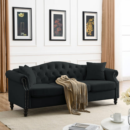 Canapé Chesterfield 3 places capitonné avec accoudoirs roulés et clous décoratifs